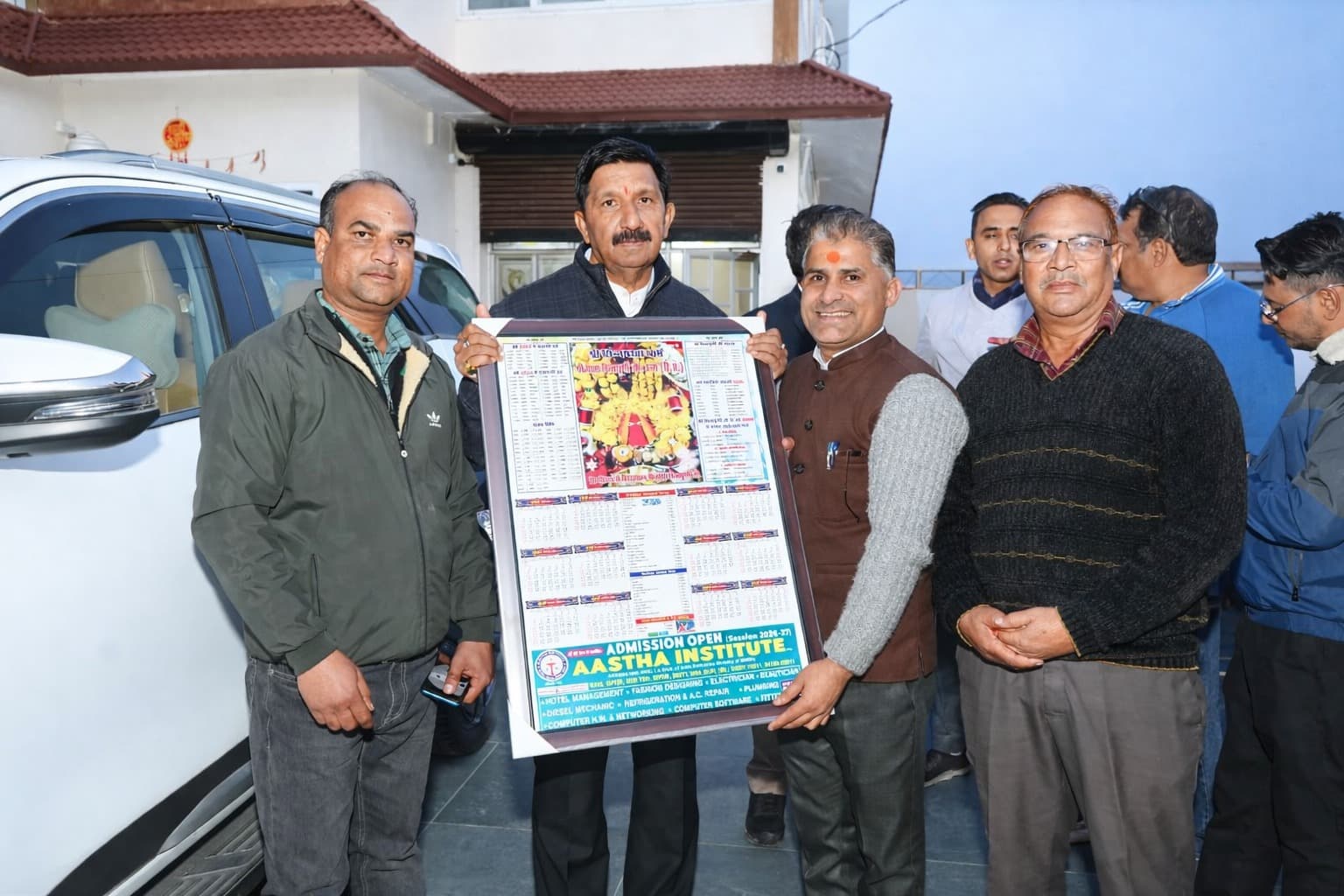 Admission open poster with institute team outdoors